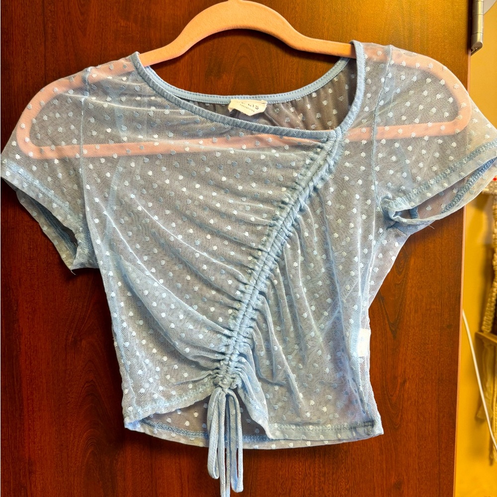 Light blue see through going out top